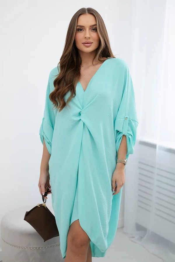 Kesi Oversize dress with a mint V-neck