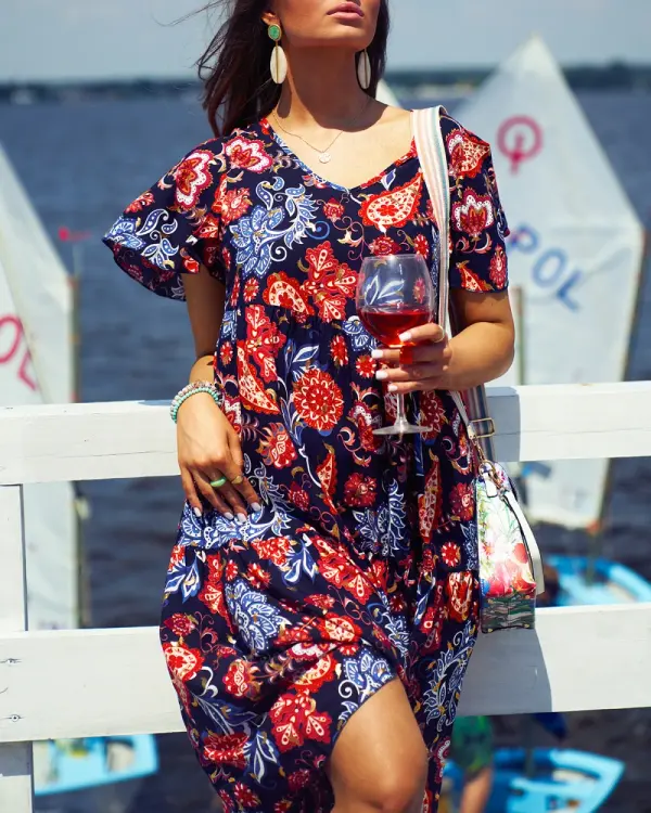 Resti Resti Navy blue women's dress with colorful floral pattern