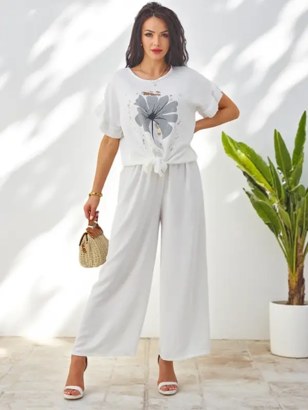 Resti Resti Women's casual set with a short-sleeve blouse and wide trousers