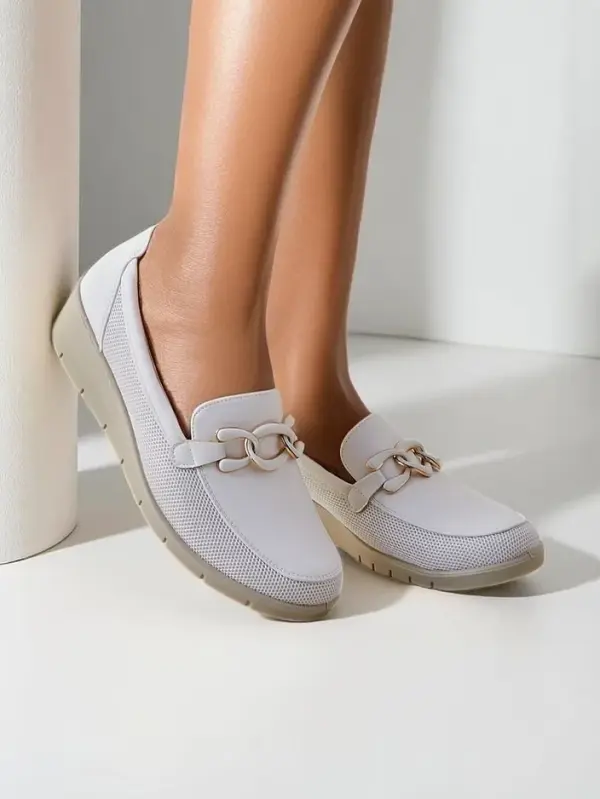 Resti Resti Women's moccasins on a low wedge Lepor