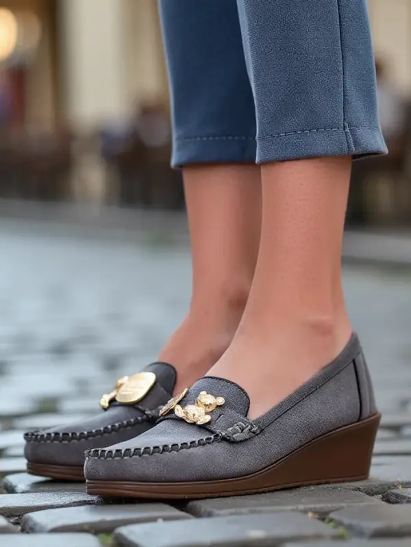 Resti Resti Women's moccasins on a low wedge Mollan