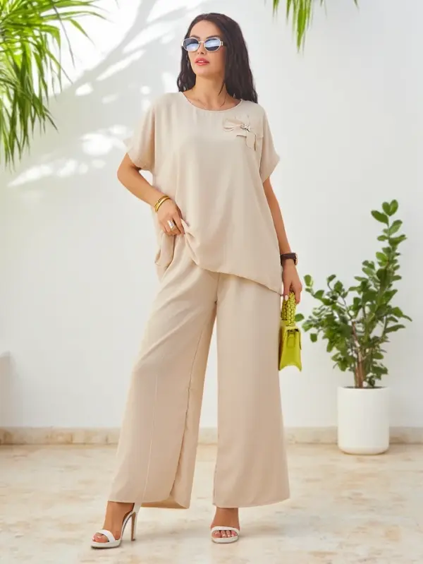 Resti Resti Women's set with short sleeves, decorative flower, and wide pants