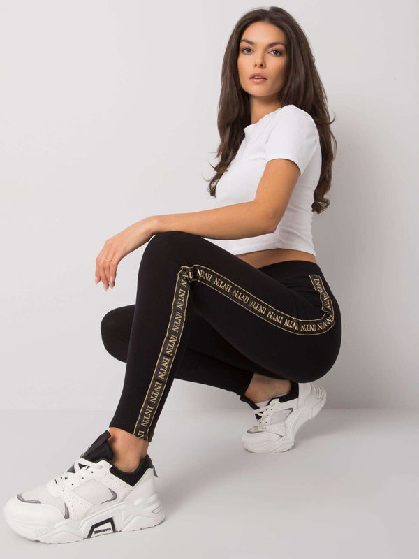 Fashionhunters RUE PARIS Black leggings with gold stripes