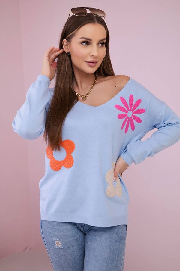 Kesi Sweater blouse with blue floral pattern