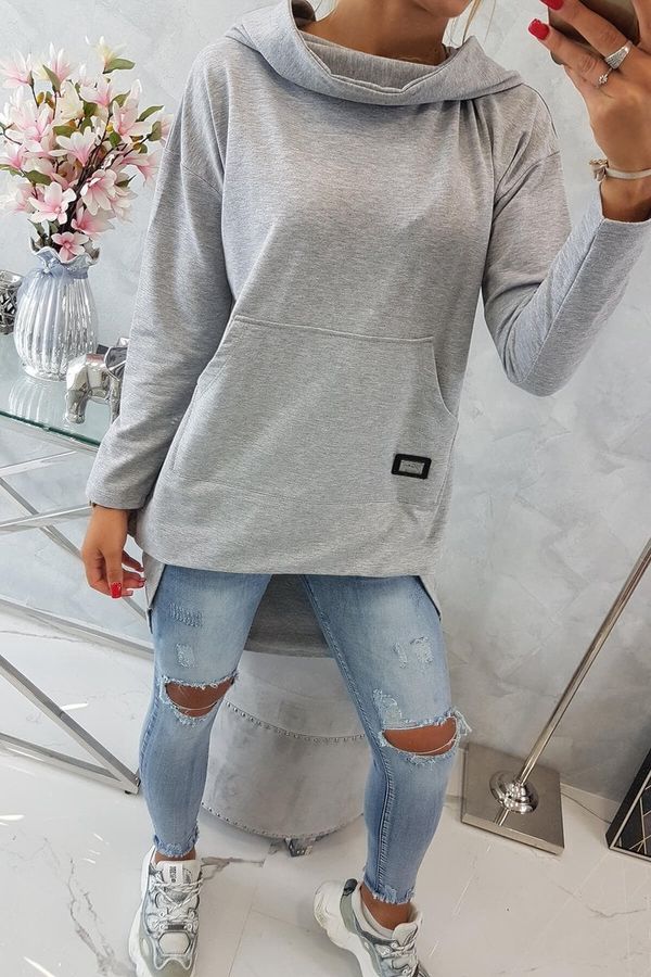 Kesi Sweatshirt with a long back and a hood in grey