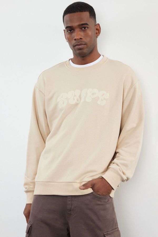 Trendyol Trendyol Beige Oversize/Wide Cut Embossed Printed Sweatshirt