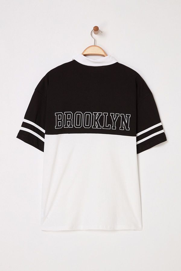 Trendyol Trendyol Black Oversize/Wide Cut Color Block Brooklyn Printed Polo Neck T-shirt
