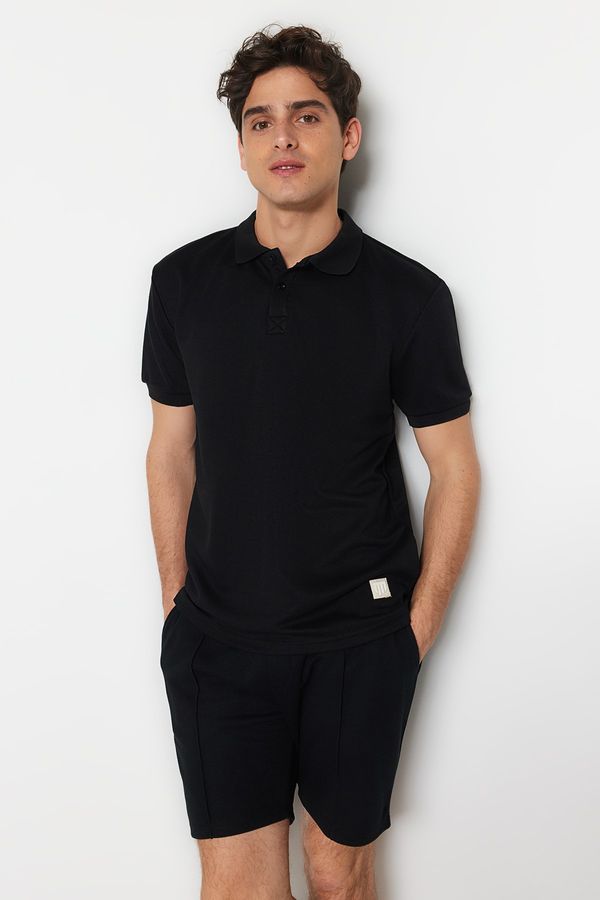 Trendyol Trendyol Black Regular/Normal Cut Short Sleeve Label Appliqued Polo Neck T-shirt