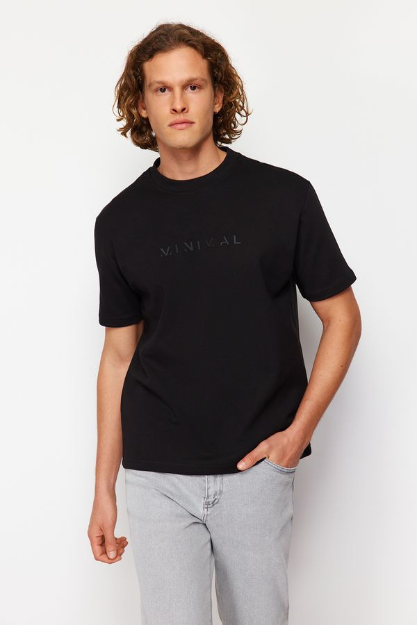 Trendyol Trendyol Black Relaxed/Casual Cut Fluffy Text Printed Short Sleeve Soild Fabric T-Shirt