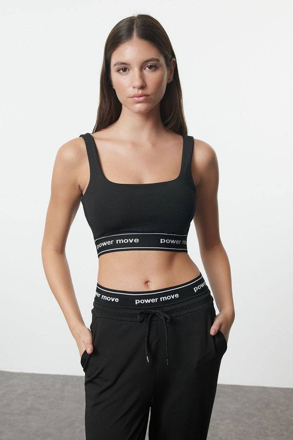 Trendyol Trendyol Black Slogan Elastic Detailed Support/Shaping Square Neck Knitted Sports Bra