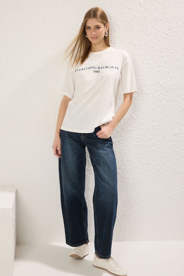 Trendyol Trendyol Ecru 100% Cotton Slogan Printed Relaxed/Wide Cut Knitted T-Shirt