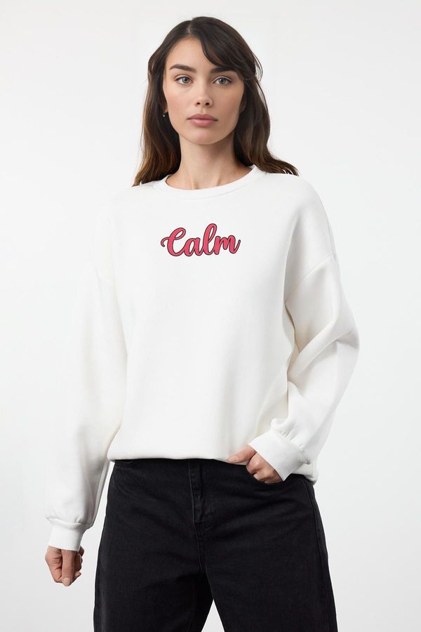 Trendyol Trendyol Ecru Slogan Printed Oversize/Wide Fit Thick Fleece Knitted Sweatshirt