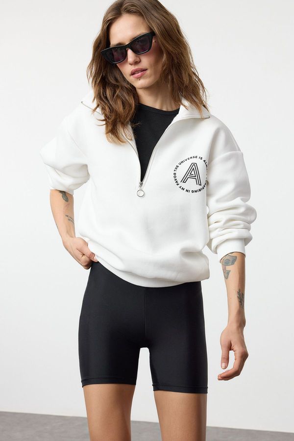 Trendyol Trendyol Ecru Slogan Printed Oversize/Wide Fit Thick Inside Fleece Knitted Sweatshirt