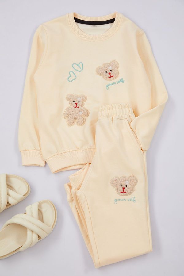 Trendyol Trendyol Girls Cream Teddy Bear Patterned Pajama Set Knitted Bottom-Top Set