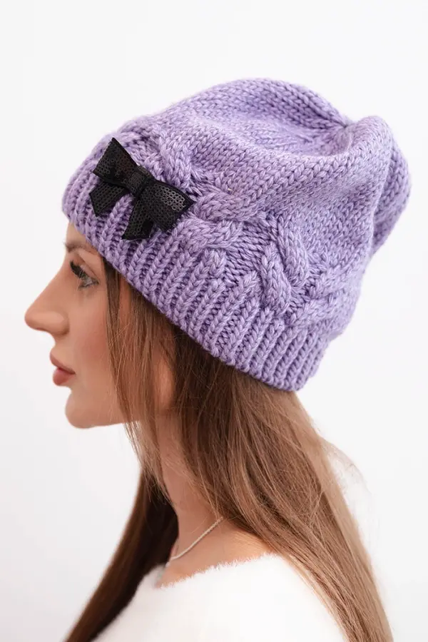 Kesi Ženska zimska kapa z okrasno pentljo K438