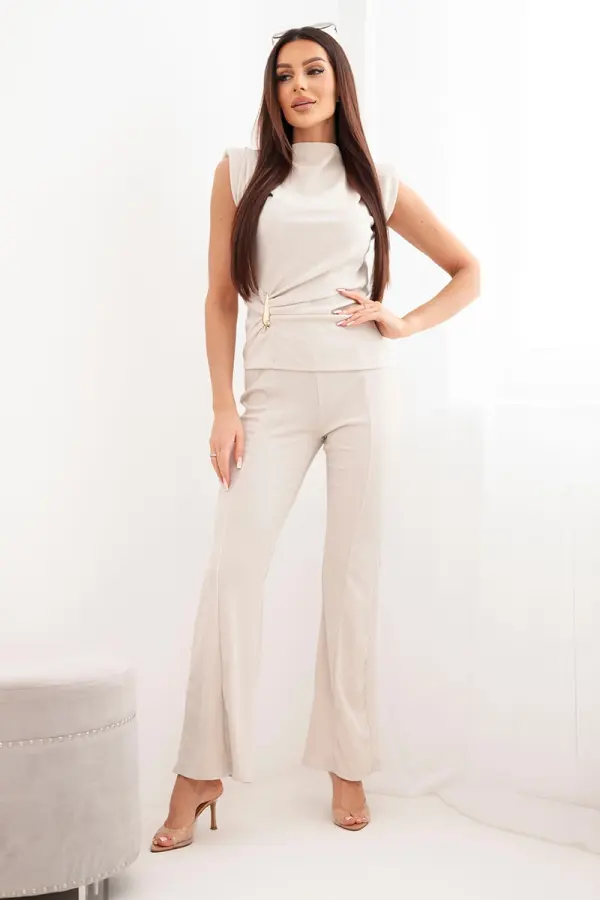 Kesi Włoski Ženski komplet z nagubano bluzo in širokimi hlačami