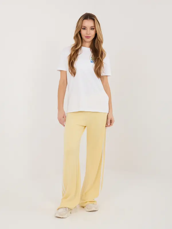 RELEVANCE Živo rumene trenirke iz džersija