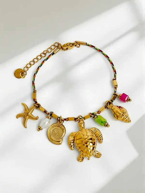 Resti Zlata zapestnica Afrodita Maretta z morskimi obeski