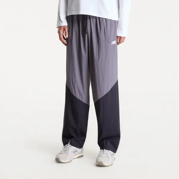 New Balance Hlače New Balance Sport Legacy Pant Neptune Grey/ Dark Night M