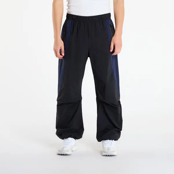 Nike Hlače Nike Tech Men's Dri-FIT Woven Color-Block Oversized Pants Black/ Obsidian/ Black M