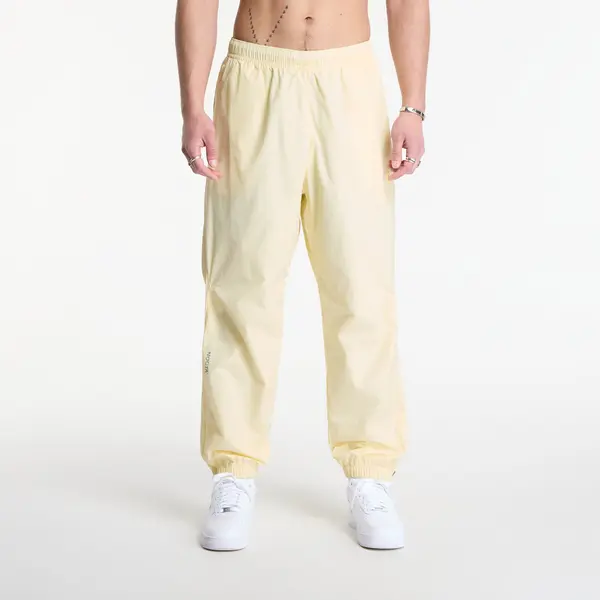 Nike Hlače Nike x NOCTA Northstar Nylon Track Pants Alabaster/ Alabaster/ Stealth M
