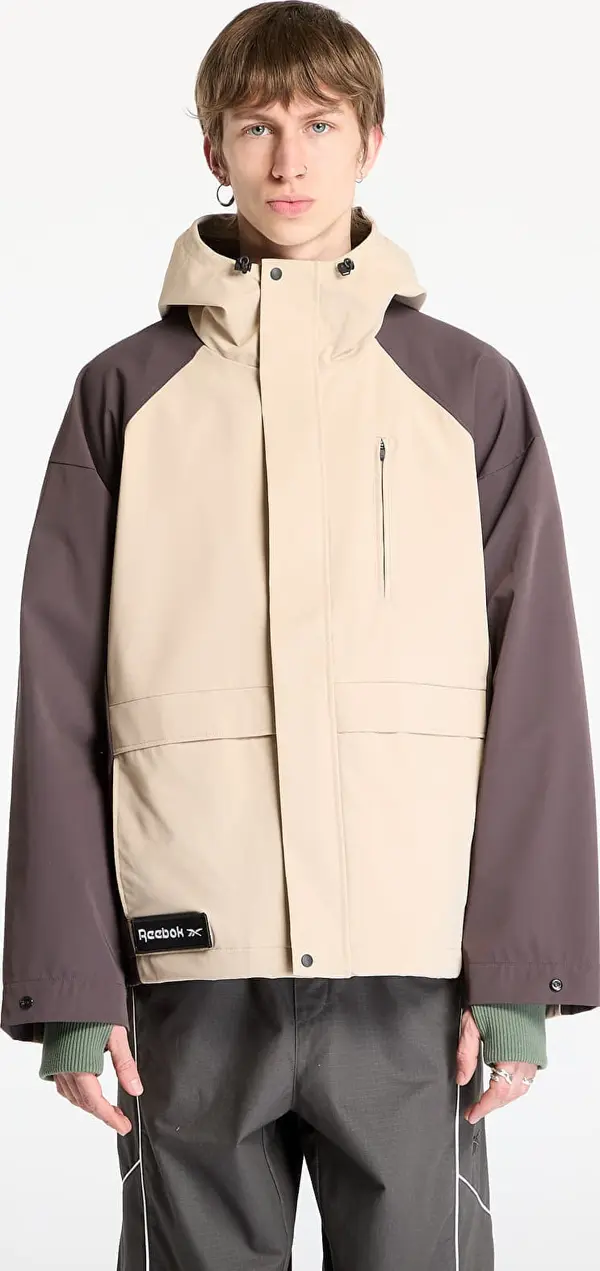 Reebok Jakna Reebok Utility Shell Jacket UNISEX Tan/ Unearthed Brown XL