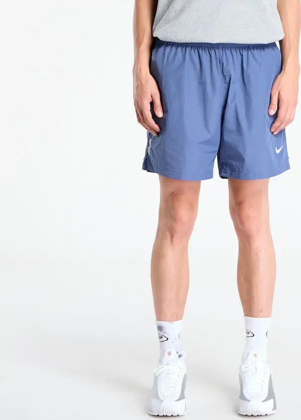 Nike Kratke hlače Nike x NOCTA Cardinal Nylon Shorts Diffused Blue/ Black/ Citron Tint XL
