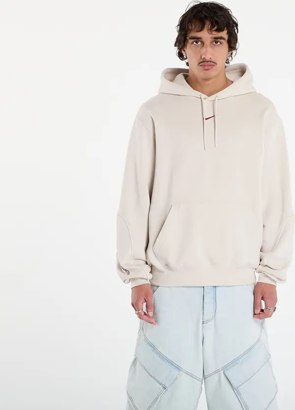 Nike Mikina Nike x NOCTA Men's Fleece Hoodie Lt Orewood Brn/ Team Red XS