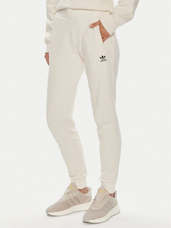 adidas adidas Spodnji del trenirke adicolor Essentials IA6477 Bež Slim Fit