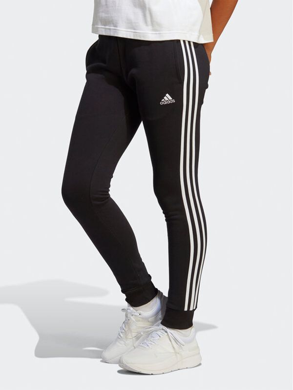 adidas adidas Spodnji del trenirke Essentials 3-Stripes French Terry Cuffed Joggers IC8770 Črna Slim Fit