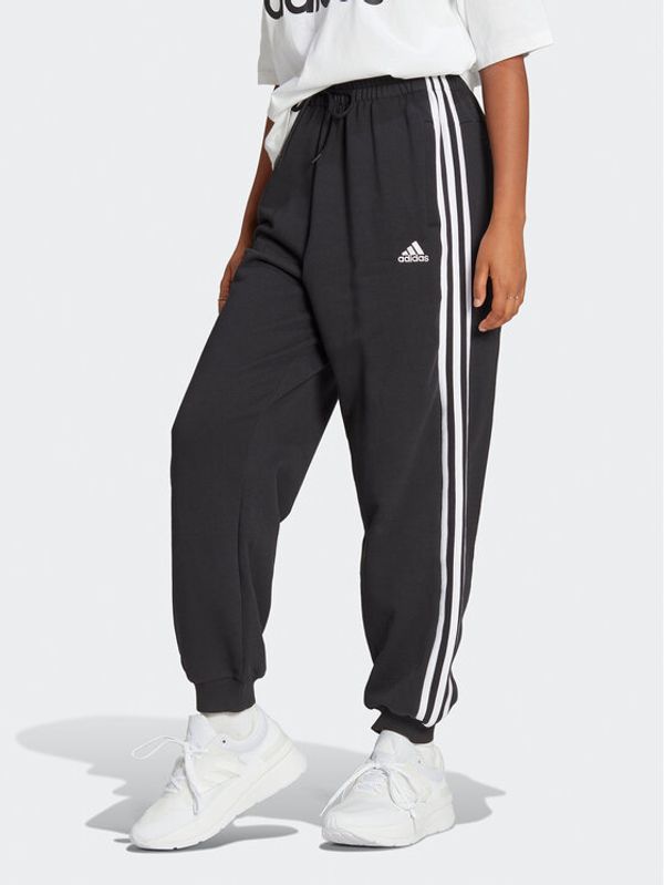 adidas adidas Spodnji del trenirke Essentials 3-Stripes French Terry Loose-Fit Joggers HA4375 Črna Loose Fit