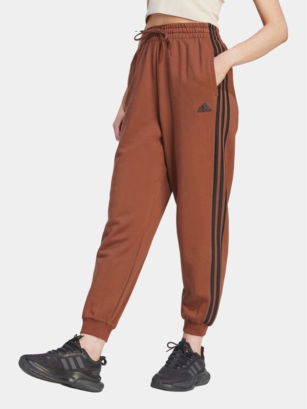 adidas adidas Spodnji del trenirke Essentials 3-Stripes IL3451 Rjava Loose Fit