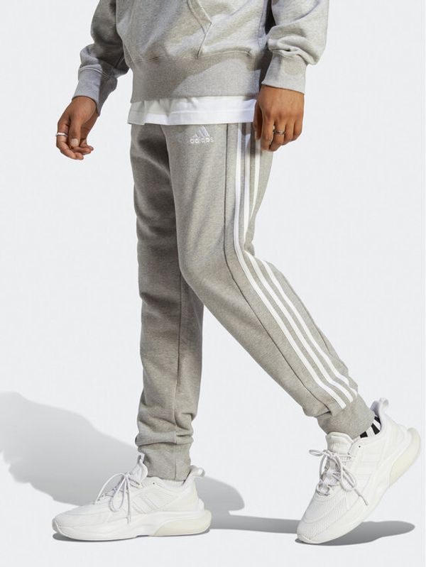 adidas adidas Spodnji del trenirke Essentials French Terry Tapered Cuff 3-Stripes Joggers IC9407 Siva Regular Fit