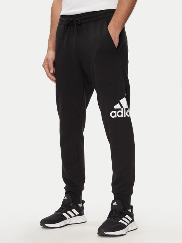 adidas adidas Spodnji del trenirke Essentials French Terry Tapered Cuff Logo Joggers HA4342 Črna Regular Fit