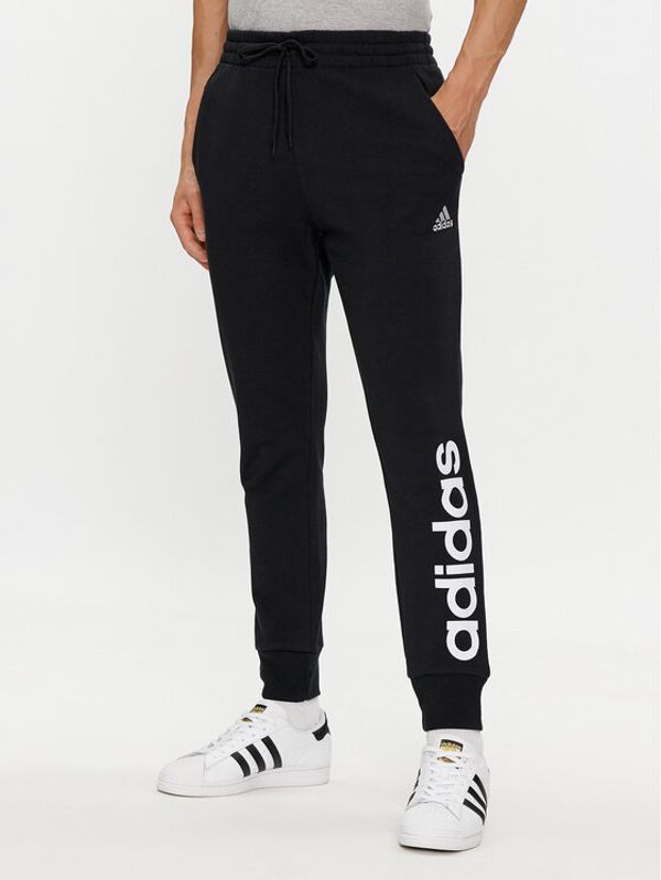 adidas adidas Spodnji del trenirke Essentials French Terry Tapered Cuff Logo Joggers IC0063 Črna Regular Fit