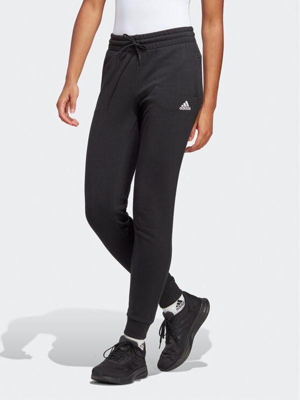 adidas adidas Spodnji del trenirke Essentials Linear French Terry Cuffed Joggers IC6868 Črna Slim Fit