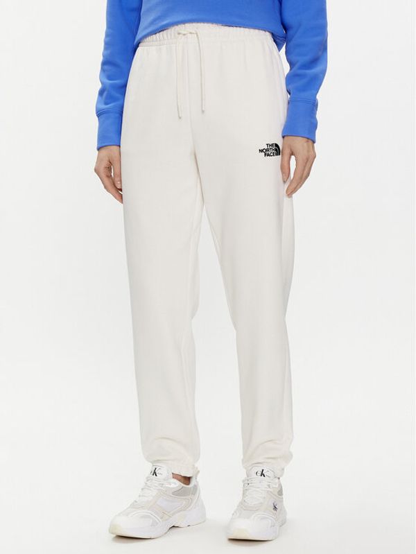 The North Face The North Face Spodnji del trenirke Essential NF0A7ZJF Écru Relaxed Fit